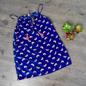 # Bright blue watermelon print tank top with tassels